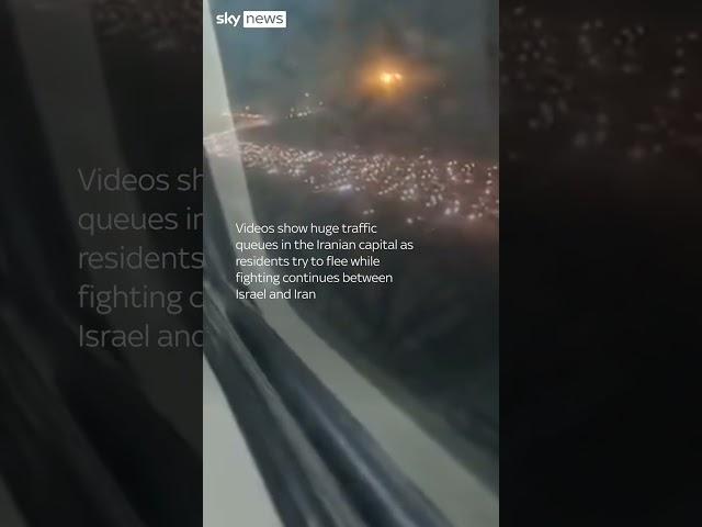 Iran: Thousands of residents flee Tehran as Trump warns 'leave immediately'