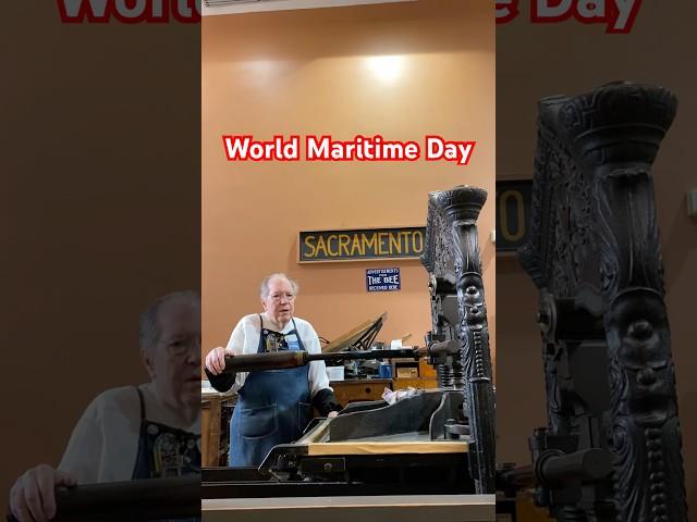 Howard navigates the printing press to print a sailor for World Maritime Day (September 26)