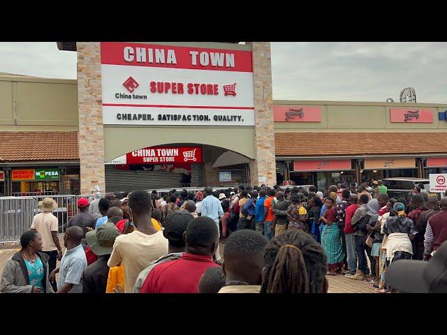 Day 4!!! Bargain Hunters Flock to China Town, Waiting for the Super Store to Open