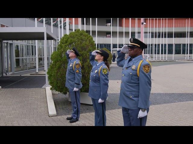 Flag lowering at UN Vienna for colleagues who have been killed in Gaza