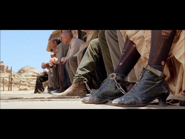 Shackled woman in western film