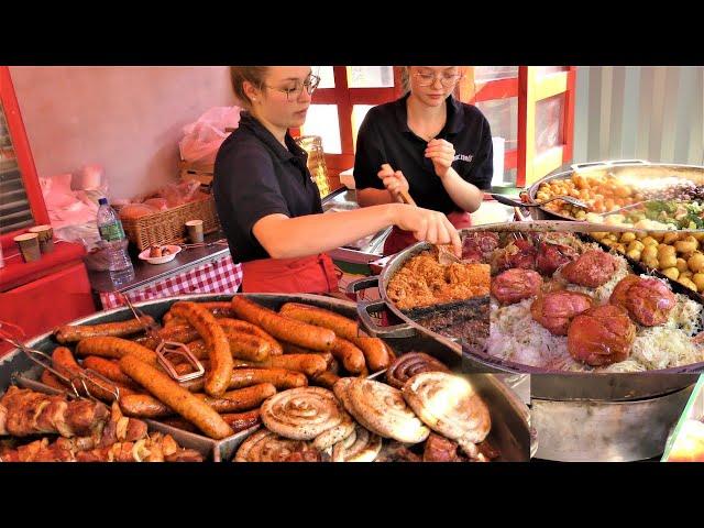 Street Food in Gdansk, Poland. Huge Sausages, Pork Knuckles, Langos, Stuffed Wrap and more