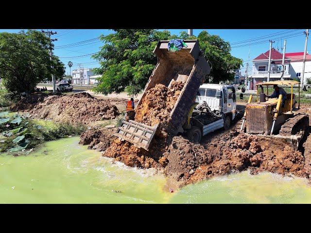 Amazing video project shows how to fill a large pond By Dozer Komatsu D50P Strong with Dozer mini