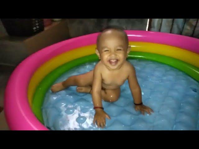 Thirdy's first swimming in the Pool