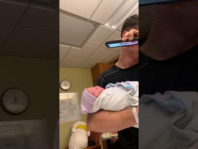 Dad Holding His Newborn Baby Starts Crying