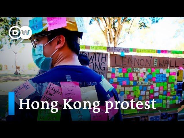 Hong Kong pro-democracy and pro-Beijing protesters clash at foreign universities | DW News