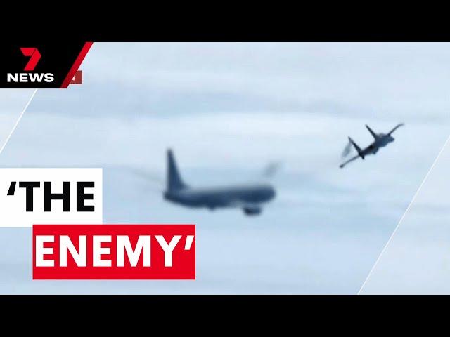 China releases video of dramatic confrontation with Australian military plane | 7NEWS