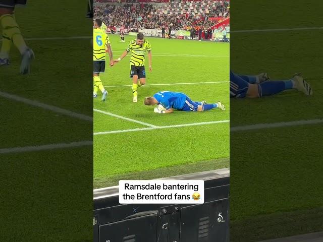 Arsenal keeper Aaron Ramsdale having a laugh with the Brentford fans