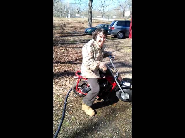 Forest's 9.5 hp minibike, I ride up steep hill.