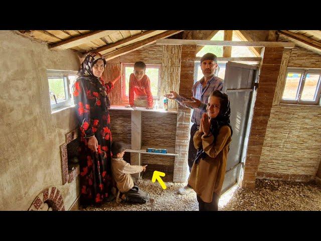Building shelves for a nomadic mother's shelter with help and kindness in the mountains