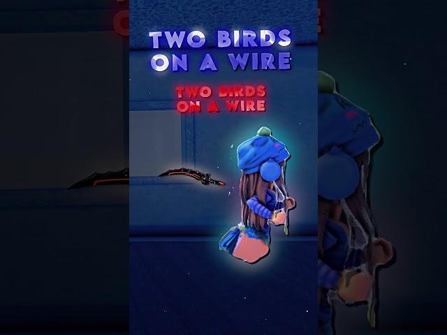 TWO BIRDS ON A WIRE