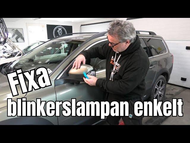 Byter blinkerslampa i backspegel. Volvo XC70 (MAGDA)