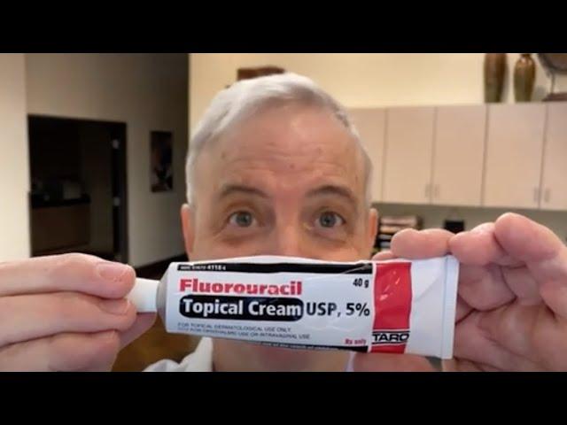 a dermatologist applies fluorouracil cream (Efudex, Efudix)