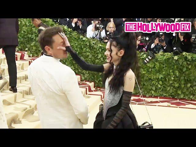 Elon Musk Gets Hit With A Facepalm From Grimes On The Red Carpet At The Met Gala In New York City