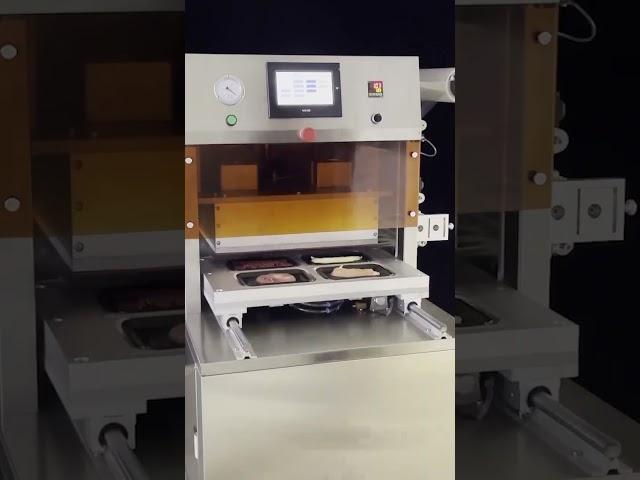 Vacuum skin packaging machine, food tray vacuum sealer, tray sealing machine