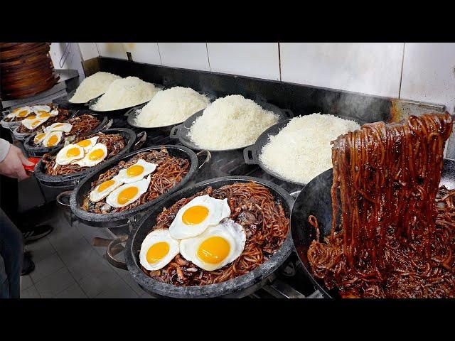 Amazing Black noodles! 482℉ Jjajangmyeon with seafood on a hot stone plate / Korean wok food