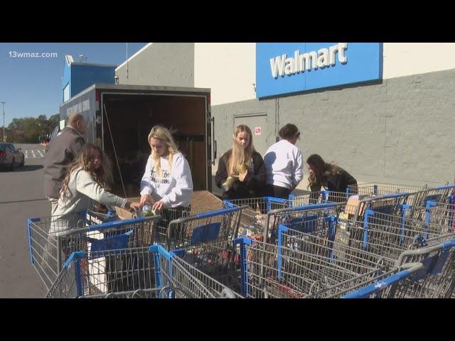 Warner Robins and Macon students come out in droves to help Stuff The Truck