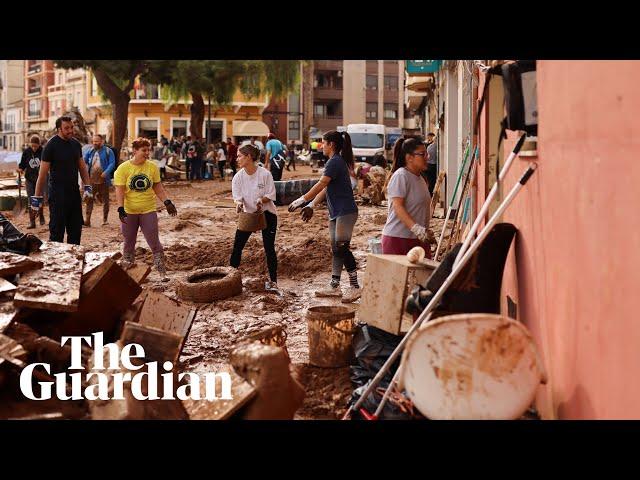 Spain floods: Thousands volunteer to help clean up as countless remain missing