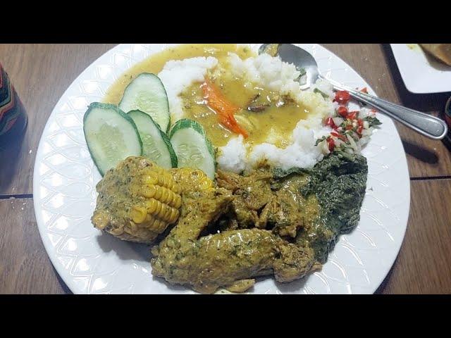 Here's a totally awesome plate of food. Curried corn, chicken, bhagi, dhal and rice SITUATION!