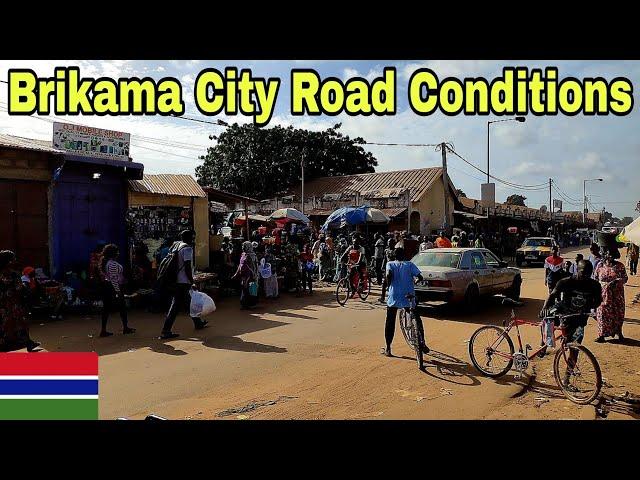 Brikama City Drive: Highway Conditions and Real Views of Roads, Markets, and Shops in Gambia Africa