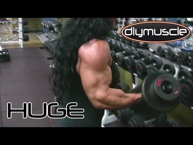BICEPS!! female bodybuilder DEBBIE BRAMWELL crushing GYM WORKOUT posing
