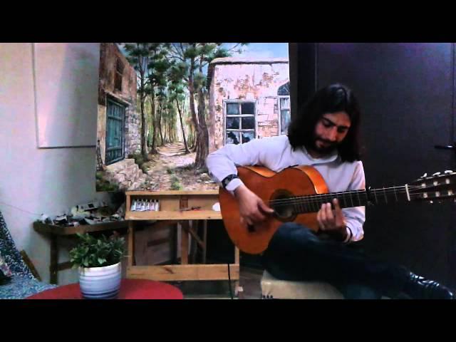 Ayman Bitar tocando una canción para Siria