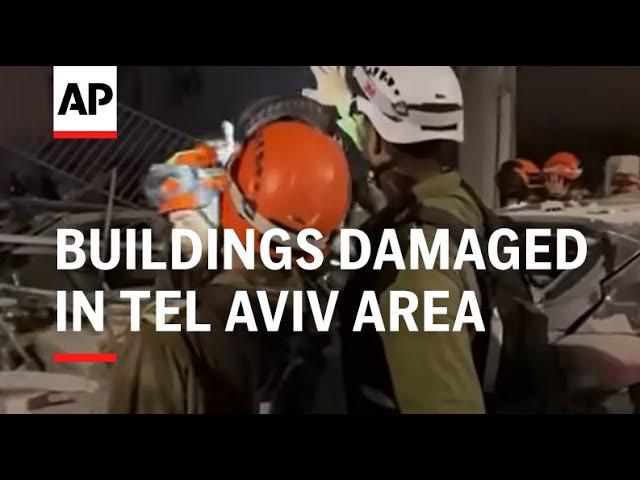 Buildings damaged in Tel Aviv area following Iranian missile attack
