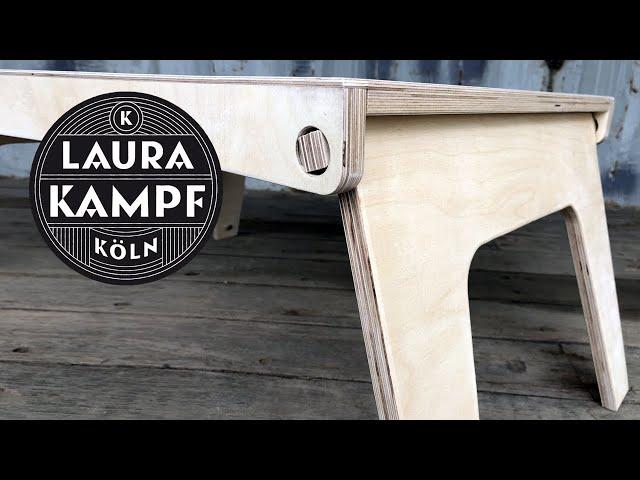 Simple folding table with wooden hinges