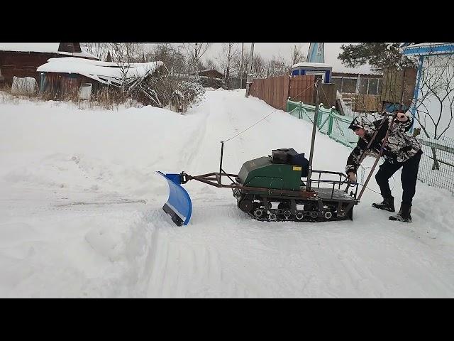 уборка снега мотобуксировщиком