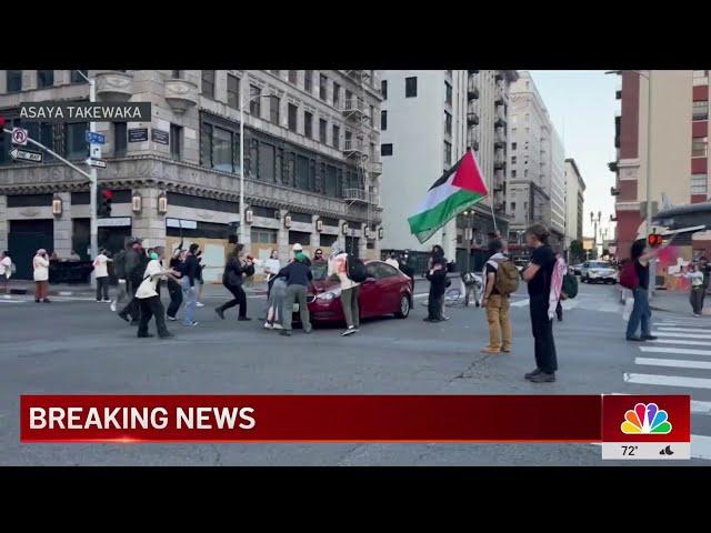 Hit-and-run driver strikes protester in downtown LA