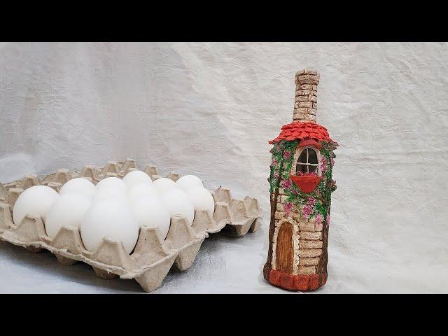 Made from egg trays and shells she made real beauty - bottle decor. Bottle decor ideas