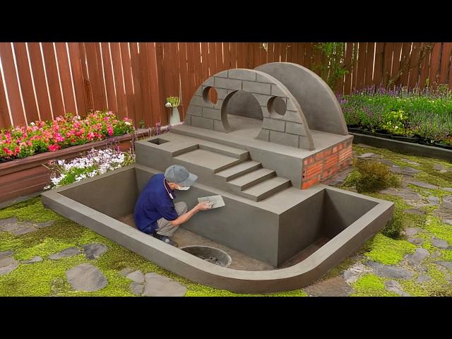 Unbelievable dog house and aquarium combo from cement