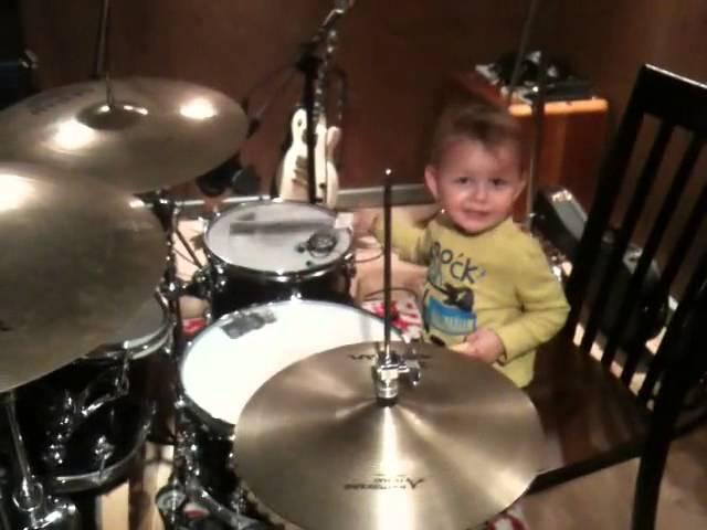 My 2 year old son Andrej playing drums first time - part 2