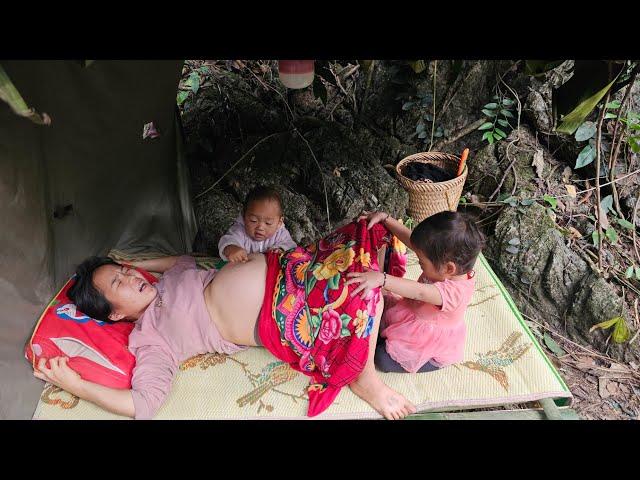 18 year old girl with 2 children living in the forest with no place to return - Mother 18 - orphan