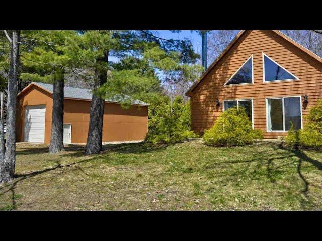 6955 Paradise Trail, Carp Lake, MI Presented by Mark Ashley.