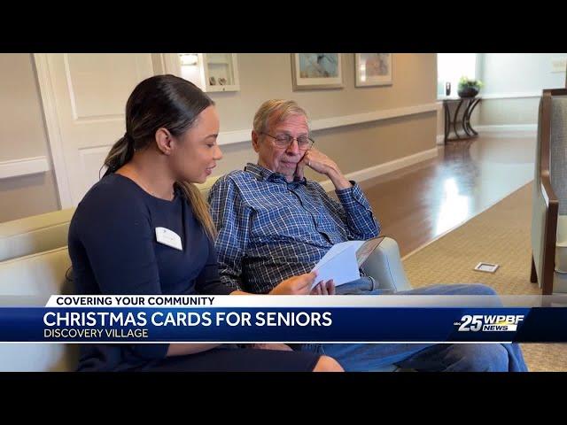 Students make Christmas cards for residents at senior living community