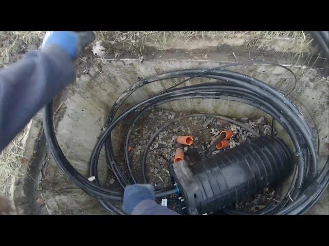 Underground fiber optic internet installation with stone driveway dig and bury