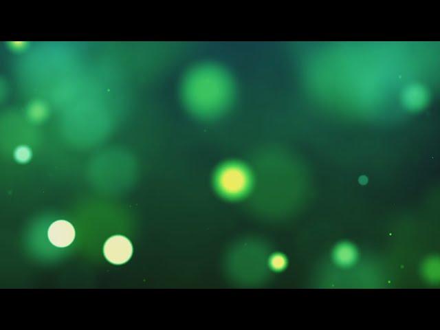 Green,Orange, Blue, Yellow  bright circles. Looped Green animated background. Relaxing Screensaver.