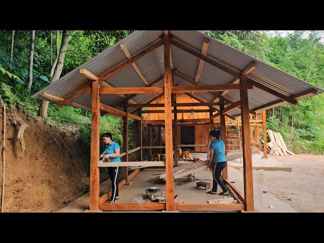 Build a wooden kitchen, using wooden bars as a frame and clearing the grass in the garden