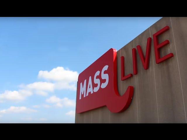 Installing the MassLive signs atop our building in downtown Springfield