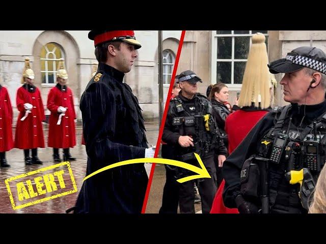 Armed Police with MP5 Firearms stand on High Alert during Torrential Downpour at Horse Guards