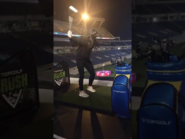 Ali Krieger plays golf