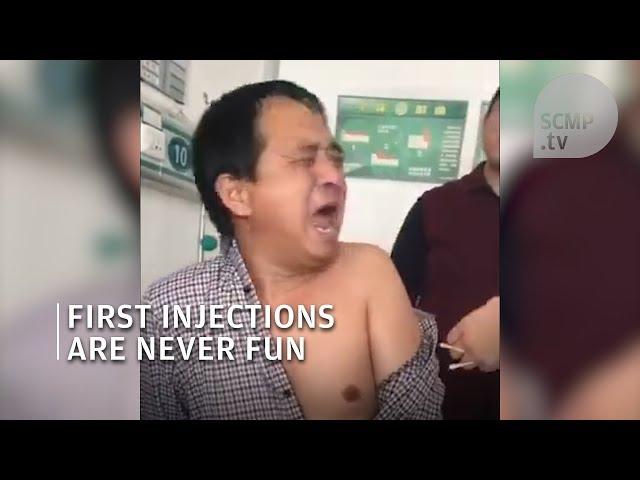 Chinese man scared of his first ever injection