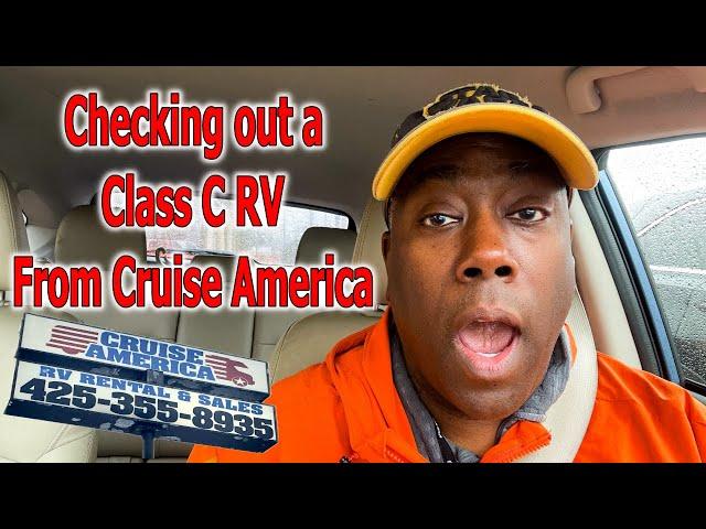 checking out an RV to buy from Cruise America