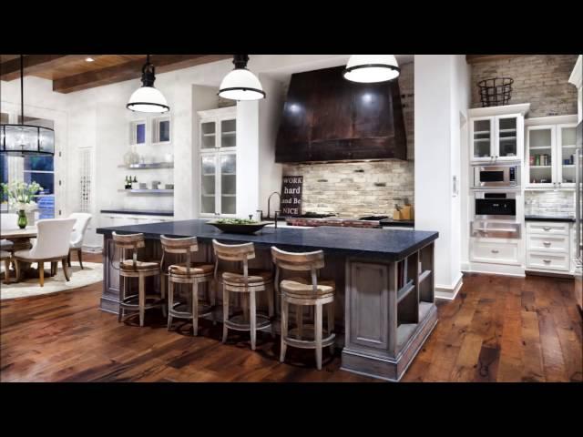 Wooden Table With White Surface And Grey Bar Stools