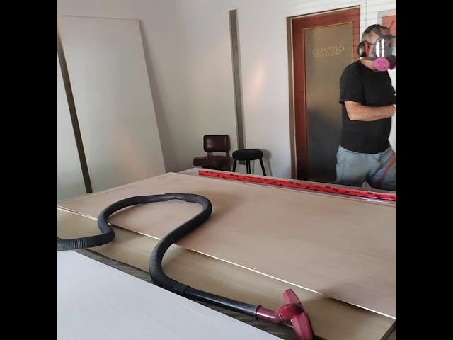 Studio sanding of large triptych panels