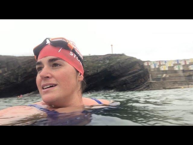 Swimming at Bude Sea Pool, Cornwall, UK.