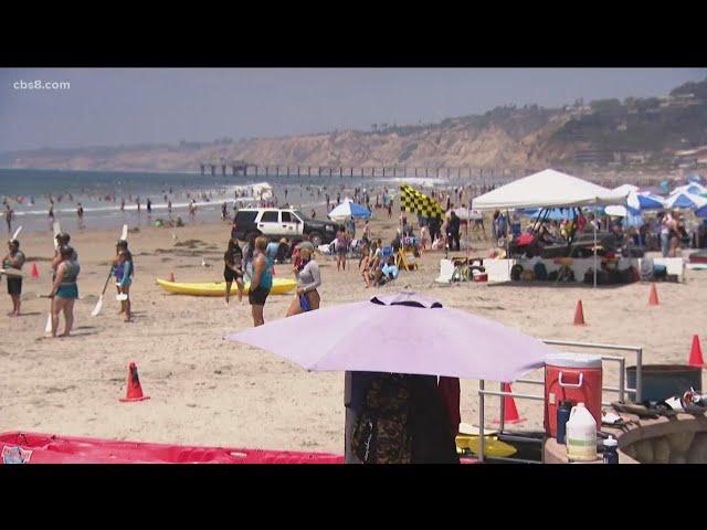 Large crowds fill San Diego County beaches as holiday weekend begins