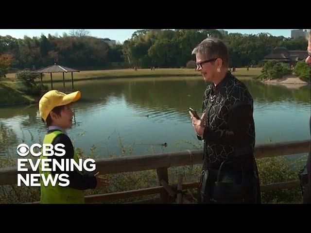 10-year-old tour guide charms tourists in Japanese garden