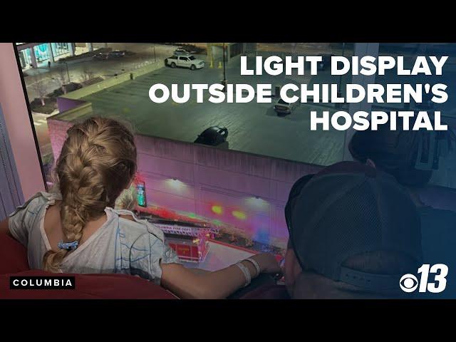 First responders create light display outside children's hospital